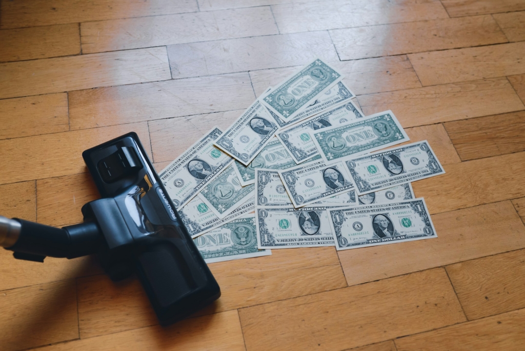 money sucked into vaccuum